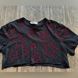 black cropped t shirt with red stars